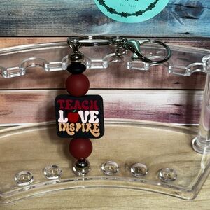 Red and Black 'Teach Love Inspire' Keychain
